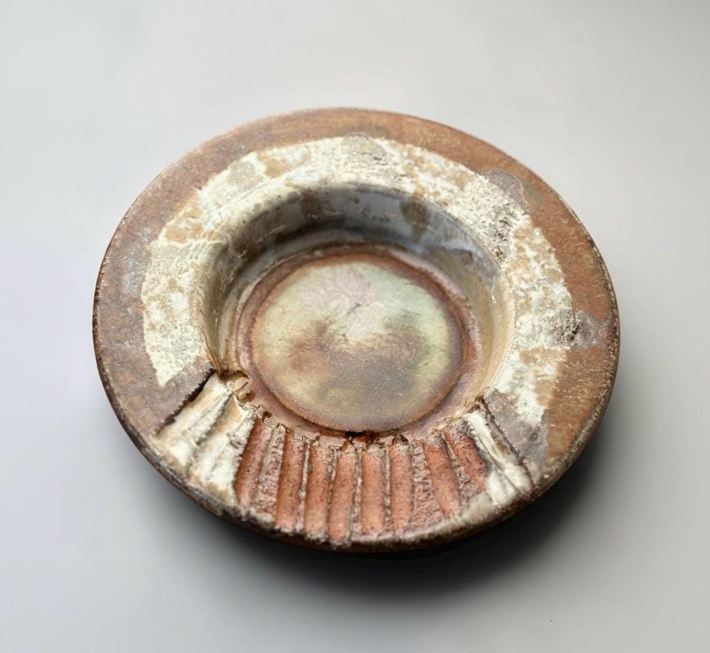 Axella stoneware bowl with rustic textured glaze