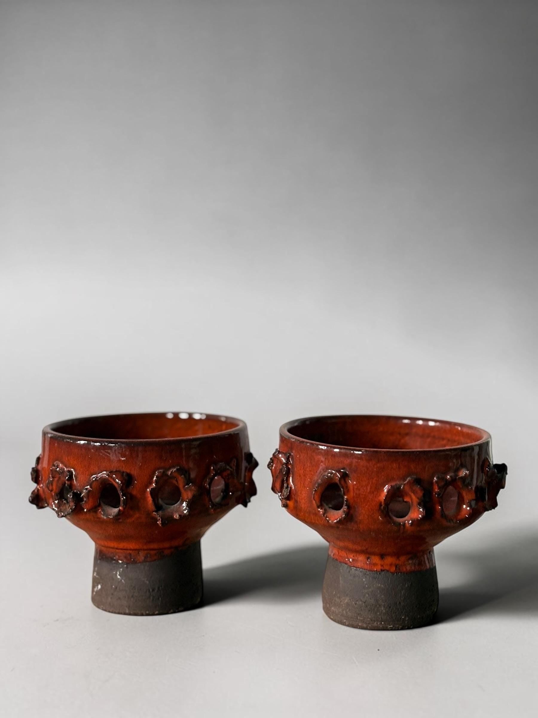 Brutalist studio ceramic candleholder pair in  pierced stoneware with orange red glaze __etsy:8163082961