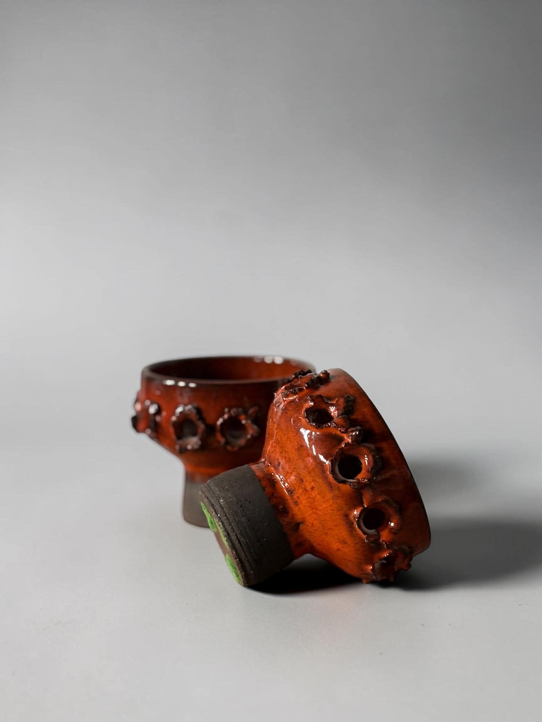 Brutalist studio ceramic candleholder pair in  pierced stoneware with orange red glaze __etsy:8115144962